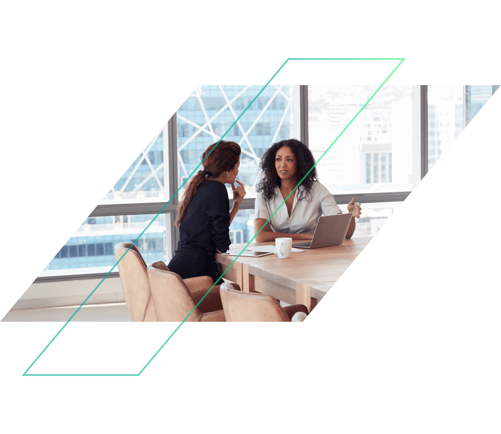 Two women talking in an office